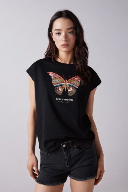 T-shirt graphique boutons épaule